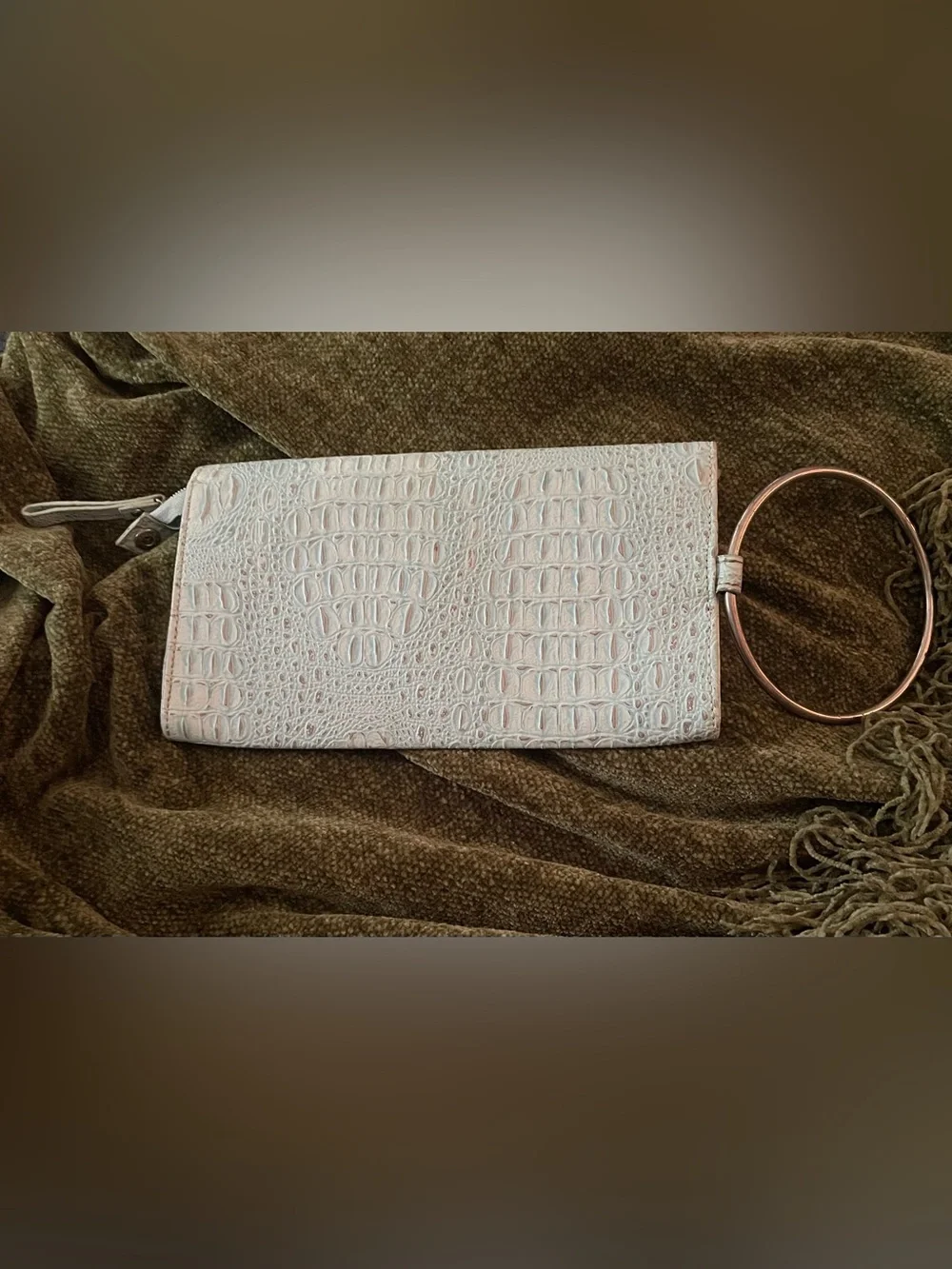 Kate Spade New York crocodile-embossed metal ring wristlet/clutch